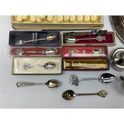 Quantity of silver plate and other metalware, to include silver napkin ring hallmarked Birmingham 1971, pair of Walker & Hall silver plated trumpet vases, pairs of candlesticks, souvenir spoons and other cutlery, etc