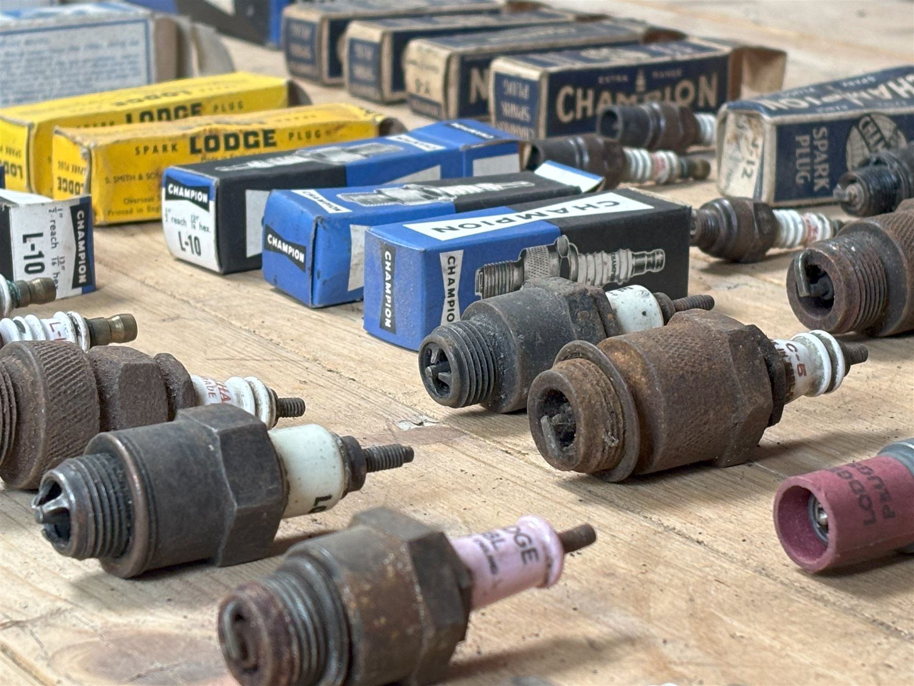 Group of collectable spark plugs, appx. 30, some unused, some with boxes, including K.L.G., Lodge, Champion etc.  - COLLECTION BY APPOINTMENT FROM: The White House, Thirsk Road, Easingwold, York, YO61 3NF - CALL 01723 507111 TO ARRANGE