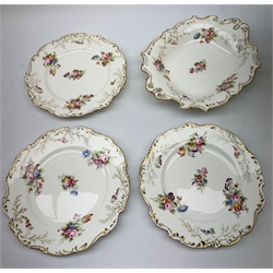19th century dessert service, comprising large comport, two serving dishes, and six plates, each painted with floral sprays within gilt borders, comport H21cm, serving dishes L28cm, plates D22cm