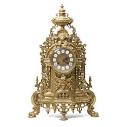 19th century design mantel clock, the brass dial with porcelain numerals, bell strike in b...