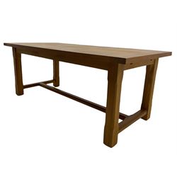 Manor Oak - light oak rectangular dining table, with two leaves.