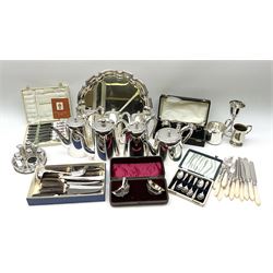 A group of silver plate and hotelware, to include coffee pots, teapot, hot water pot, milk jug, salver with pie crust rim, cased cruet set, cased set of twin open salts, cased set of six coffee spoons, pastry forks and knives with oblique reeded mother of pearl handles, etc. 