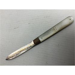 Silver mounted dressing table mirror, embossed with birds, masks, and foliate and C scrolls, hallmarked Birmingham, and fruit knife with mother of pearl handle and silver blade, (2)