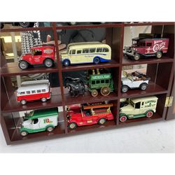 Collection of die-cast vehicles to include Corgi, Dinky, Lledo and Days Gone, housed in six wood display units