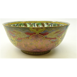  Daisy Makeig-Jones for Wedgwood lustre bowl, the exterior decorated in the 'Nizami' pattern and the interior having a border of bell shaped flowers and stylised foliage, D21cm   