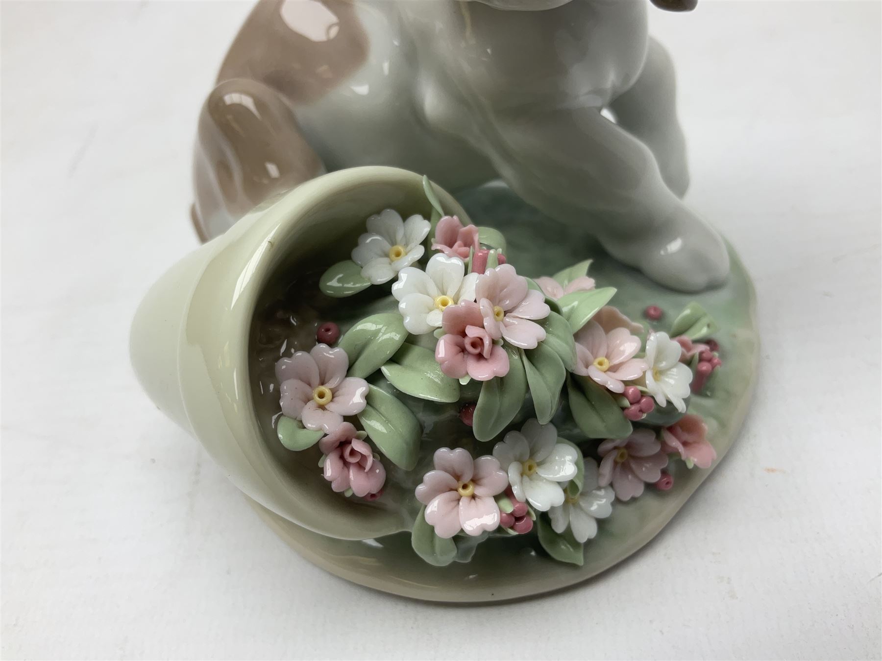 Six Lladro figures, comprising Naughty Dog no 4982, Best Friend 7620 and My Buddy no 7609, Kitty Confrontation no 1442, It Wasn't Me no 7672 and Rabbit Eating no 4772, three with original boxes, largest example H22cm