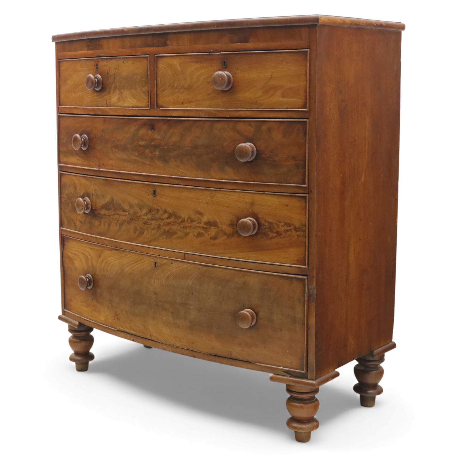 19th century mahogany bow-front chest, with two short over three long graduated drawers, fitted with turned wooden knobs, raised on turned bun feet