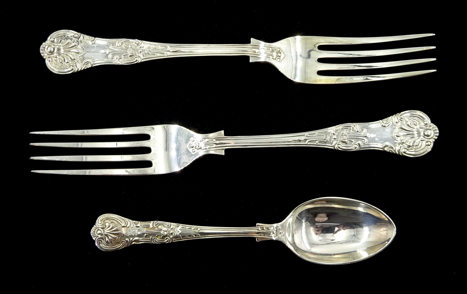 Two silver forks Queen pattern by Hugh Crawshaw, Sheffield 1988 and a similar teaspoon by W P & P, Sheffield 1962, approx 5.1oz