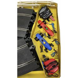 Scalextric - Marks & Spencer Starsky & Hutch set with '76 Gran Torino and Chevrolet Corvette cars, boxed; an earlier Tri-ang Scalextric 'Set 30' Model Motor Racing set containing Lotus and Cooper racing cars with controllers, track, figures and instruction pack, boxed; and a Scalextric catalogue Fifth edition c1964