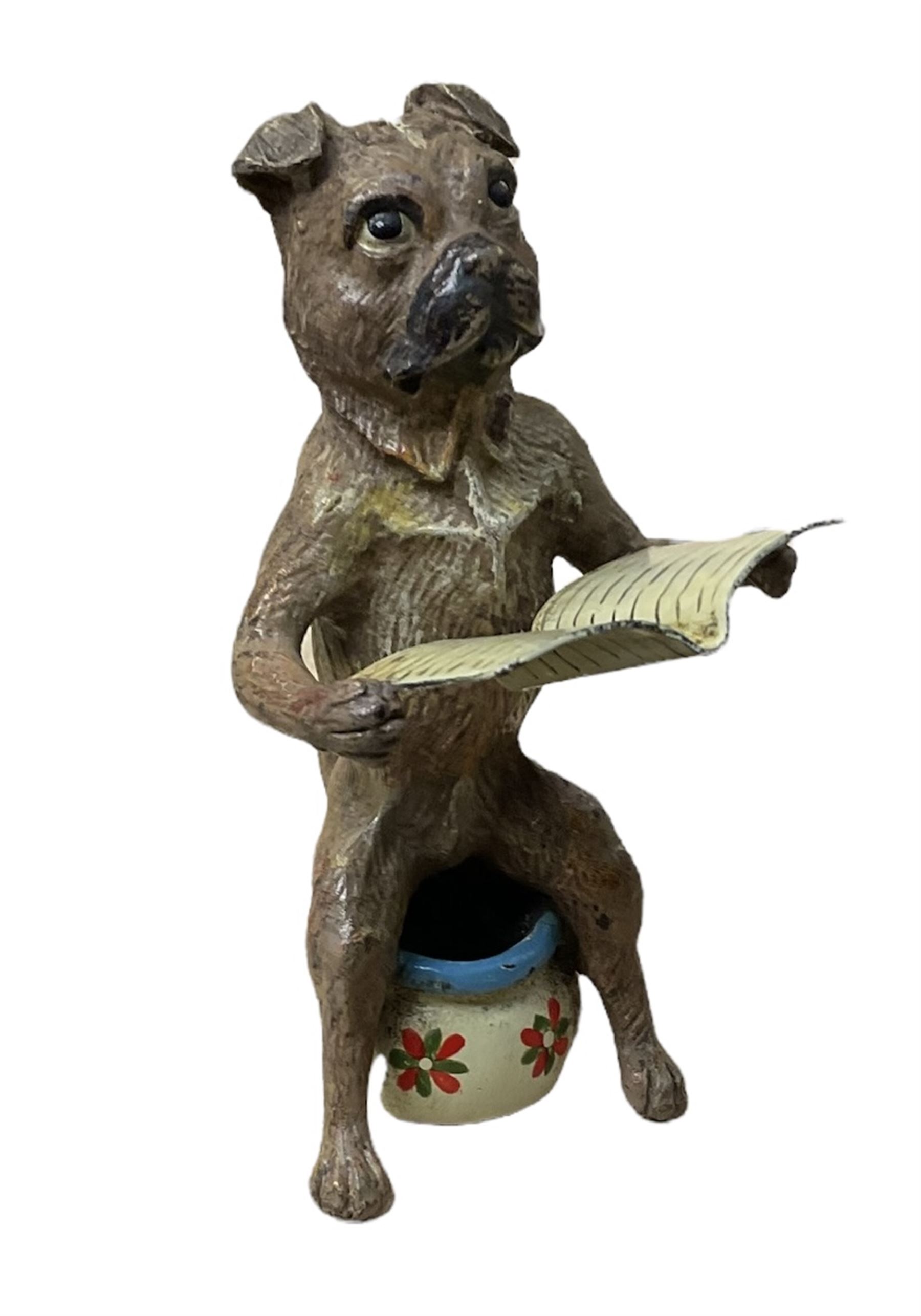 After Franz Bergmann (1861-1936): Austrian cold painted bronze figure of a pug dog reading a book, sitting on a chamber pot, with Bergmann type mark beneath H8cm