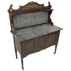 Late Victorian washstand, raised marble back with scroll and foliate carved pediment, rectangular top over three panelled cupboard doors, on turned supports with castors