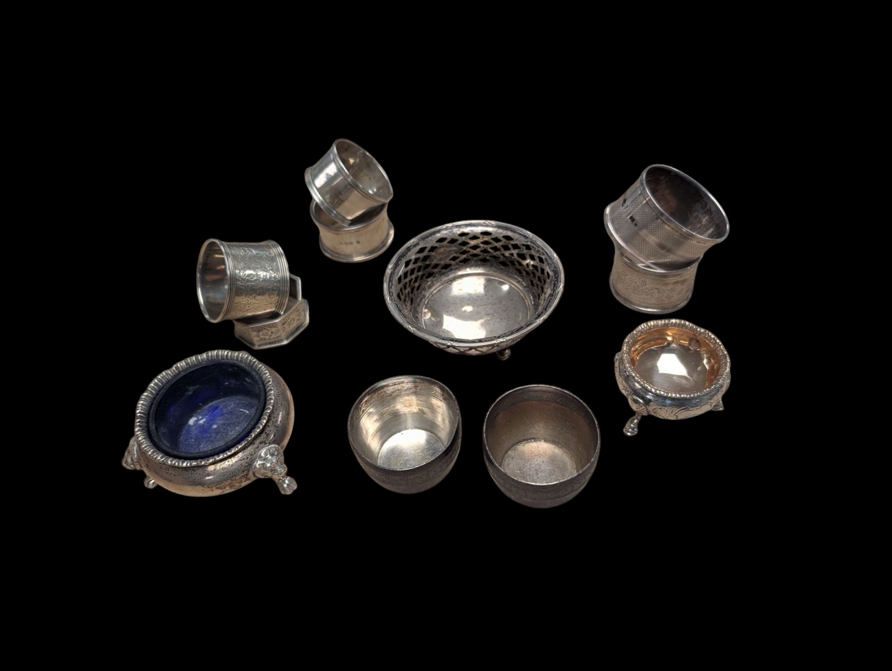 Group of silver, comprising napkin rings, open salts, egg cups, etc all hallmarked 