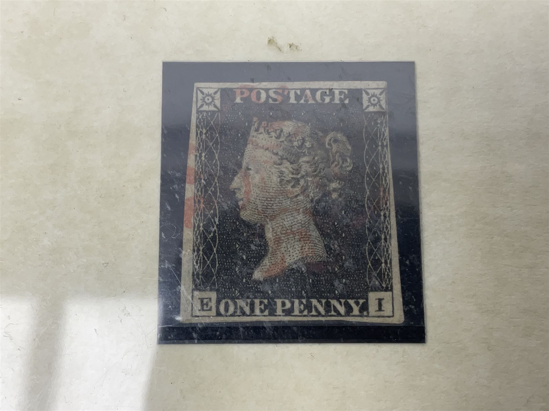 Great Britain Queen Victoria penny black stamp with red MX cancel, housed in a Westminster folder
