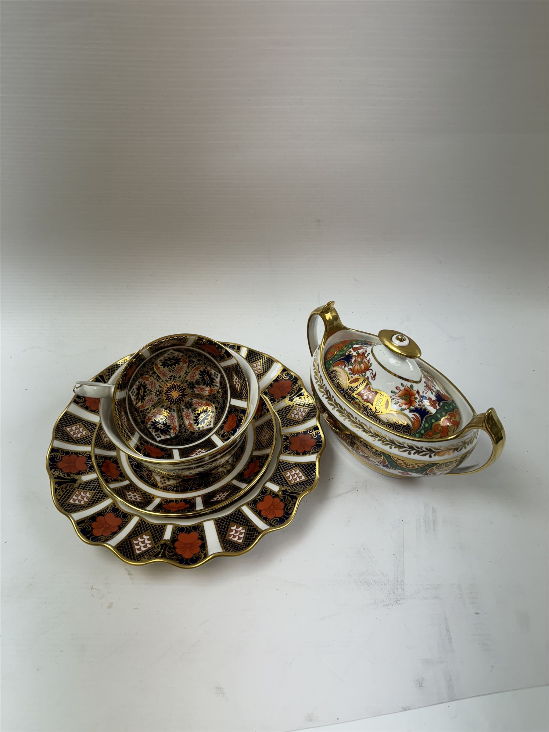 Royal Crown Derby 1128 Old Imari pattern, teacup and saucer, plate with fluted edge and open sucrier, together with spode twin handled sucrier