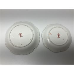 Two Royal Crown Derby Goldfinch Nesting paperweights with silver stoppers, together with two Royal Crown Derby imari pin dishes, largest dish D13cm