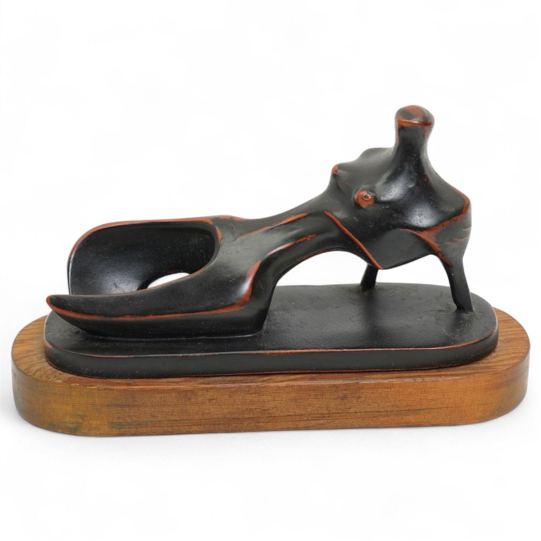 After Henry Moore (British 1898-1986): 'Reclining Figure', terracotta maquette sculpture, base marked with affixed catalogue label inscribed 'Reclining Figure: 1945 Archive 0041731', W21cm H12cm
