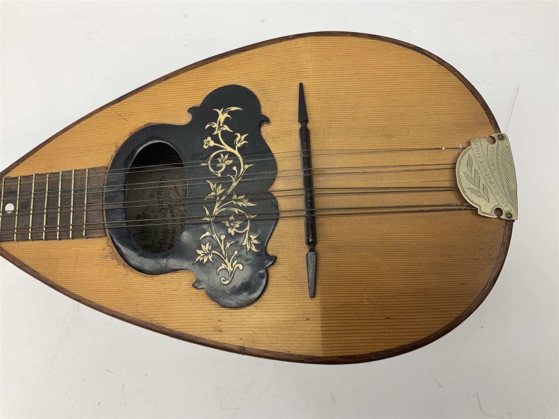 Italian mandolin, with foliate inlaid scratchplate, paper label inscribed 'Carlo Loveri & Figlio of Napoli', L62cm
