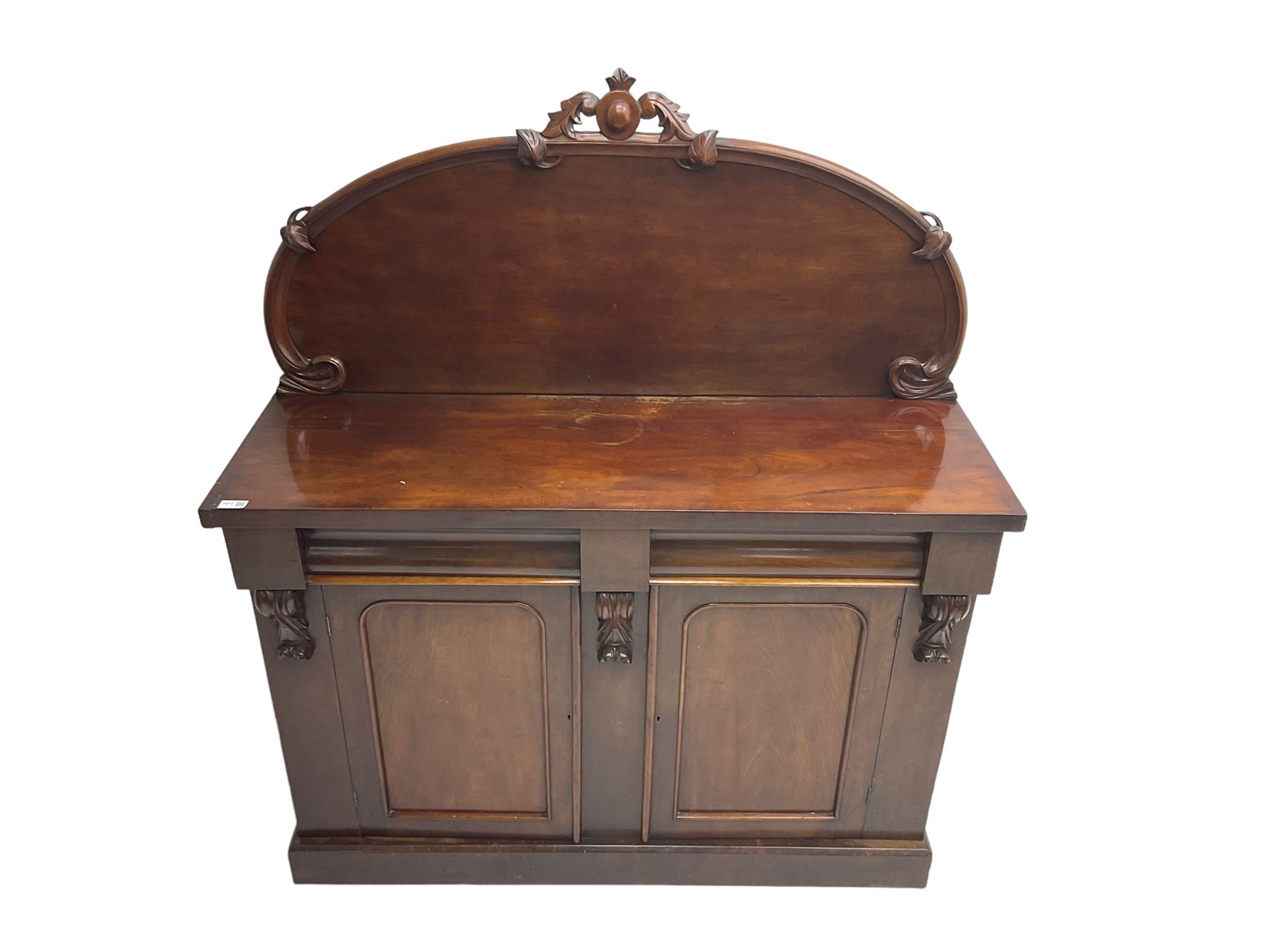 Victorian mahogany chiffonier sideboard, raised back with central cartouche pediment, fitted with two two drawers over two panelled cupboards, flanked by foliate corbels