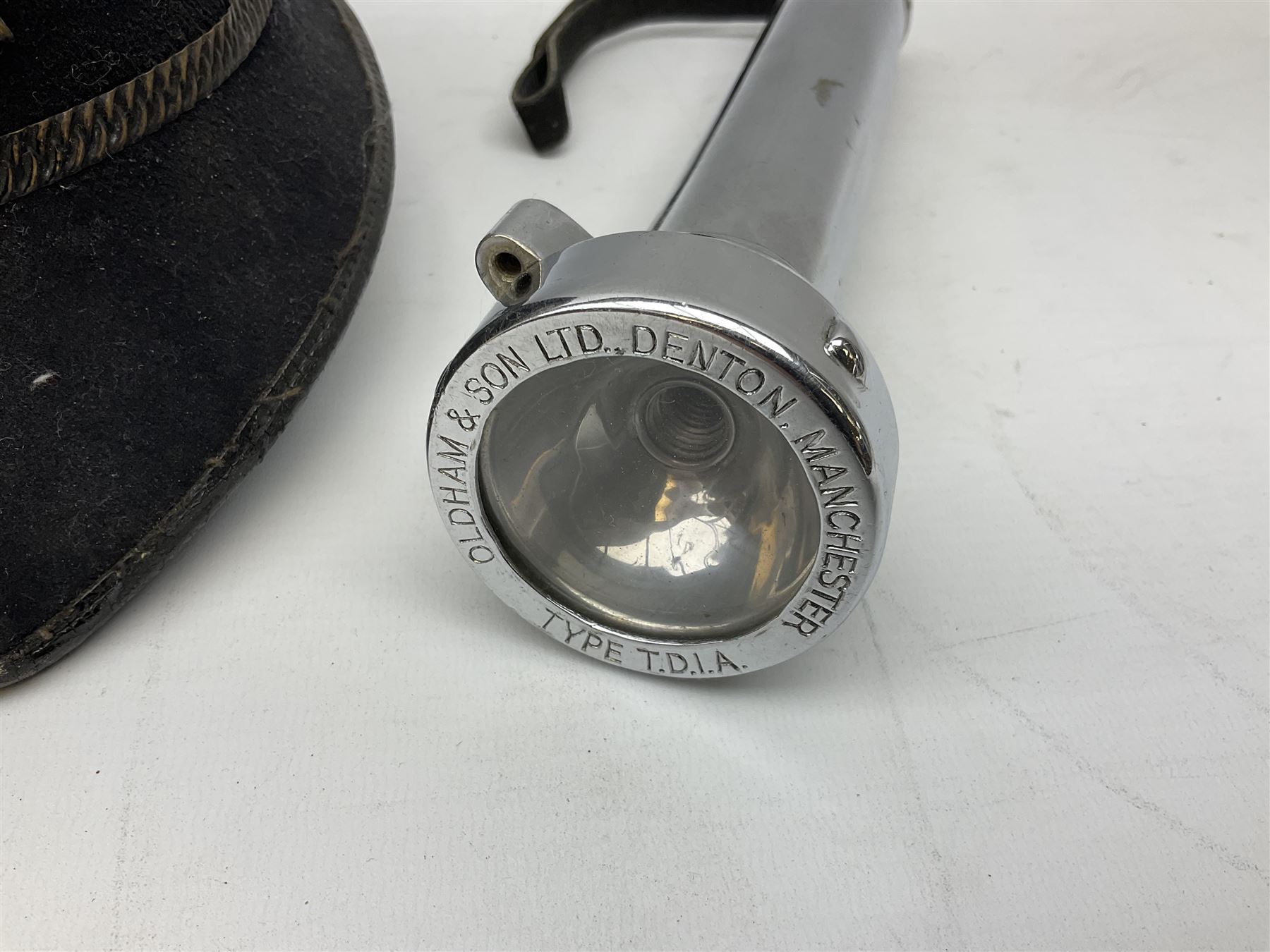 Hull City Police - Christy's London helmet with king's crown plate and an Oldham & Son Ltd Denton Manchester Type T.D.I.A. chromium cased safety torch (2)  