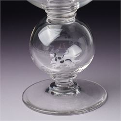 Set of six 1930s glass goblets by William Swingewood for Stevens & Williams, each goblet with lampwork glass stem, the large hollow blown knop containing dog, pair of hounds, horse, raven and two with flowers, H18cm (6)