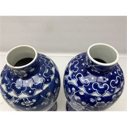 Two Chinese Prunus pattern jars, each of slender baluster form, lacking covers, H31cm