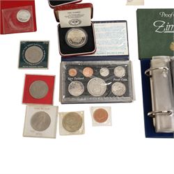 Three international proof coin sets produced by The Franklin Mint and containing high denomination silver coins, comprising Republic of Seychelles 1976 eight coin set, Republic of Panama 1976 nine coin set, Papua New Guinea 1976 eight coin set; four silver proof one ounce coins; eight Royal Mint international year sets, etc