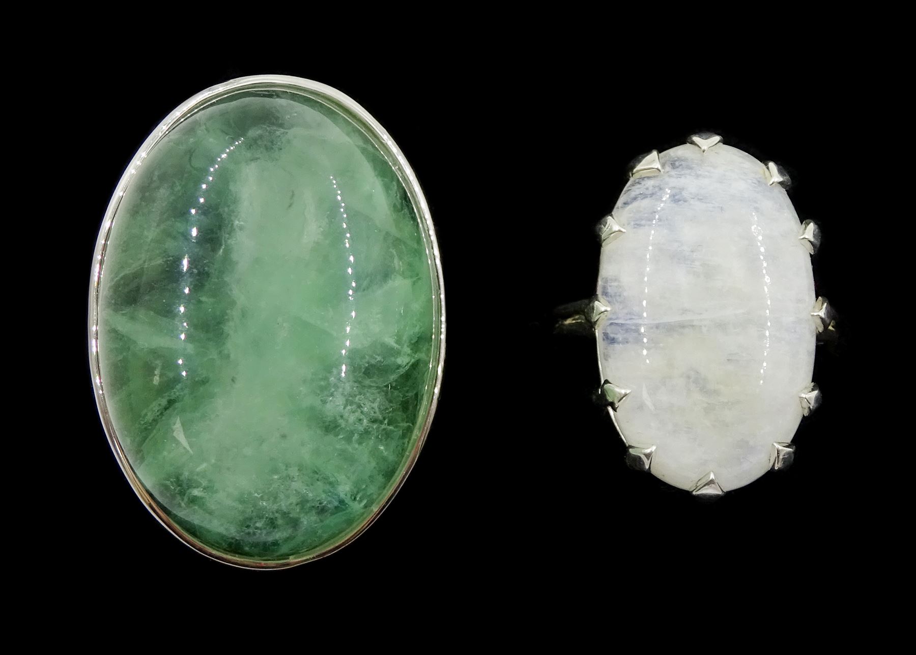 Silver single stone moonstone ring and a large silver green fluorite ring, both stamped925