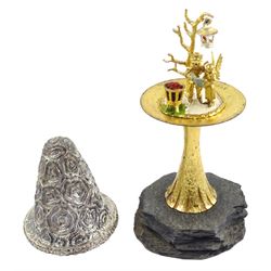 Christopher Nigel Lawrence limited edition silver and parcel gilt surprise mushroom, the textured domed cover opening to reveal two elves carolling beneath a lantern and before a fire pit set with semi-precious stones, upon a slate base, no 24/250, hallmarked Christopher Nigel Lawrence, London 1982, overall H9cm