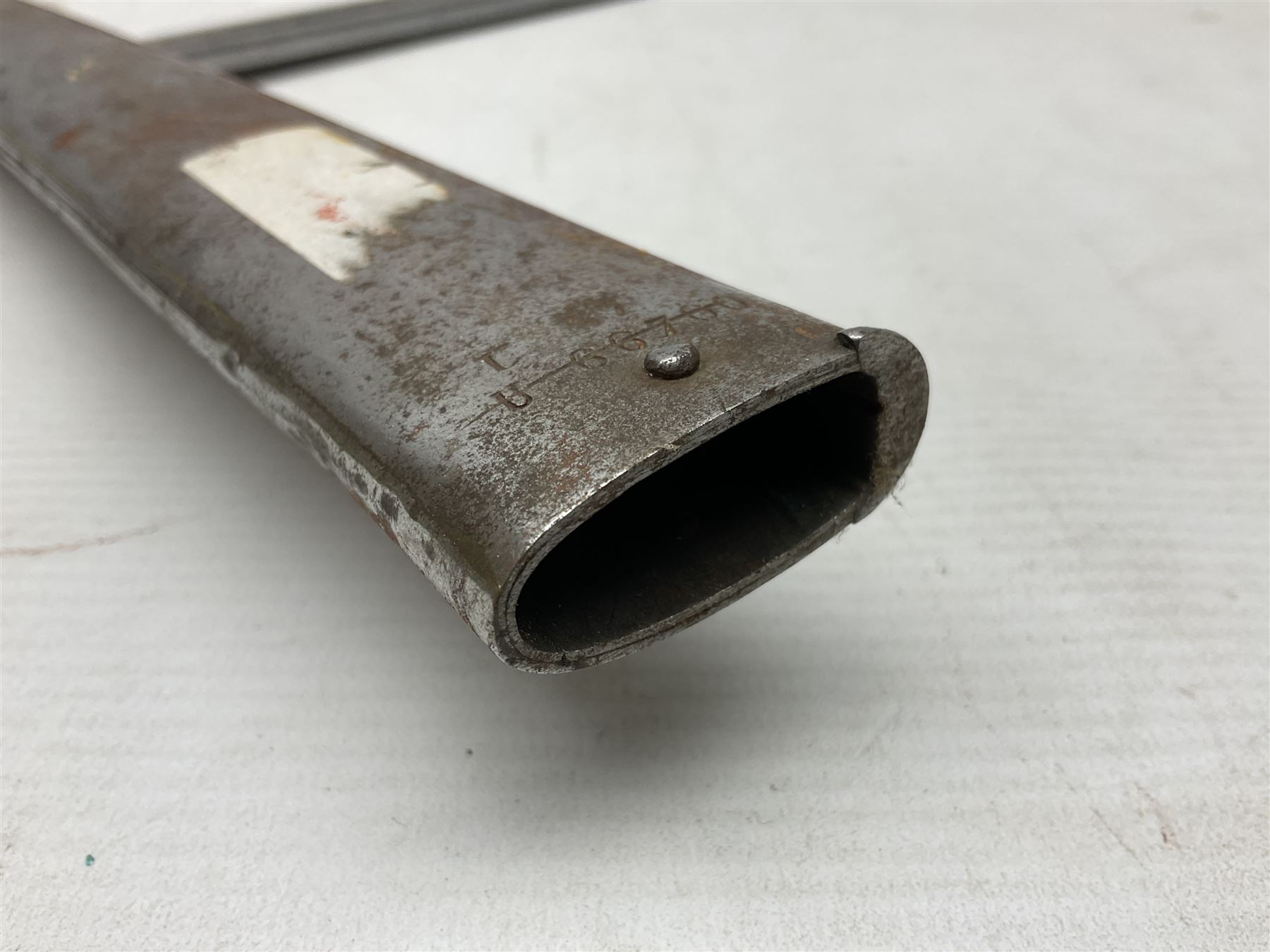 French model 1866 sabre bayonet, the 57.5cm curving blade marked St. Etienne 1873; in associated steel scabbard L71cm; and Mosin-Nagant M1891 socket bayonet with 43cm cruciform blade No.37068 (no scabbard) (2)