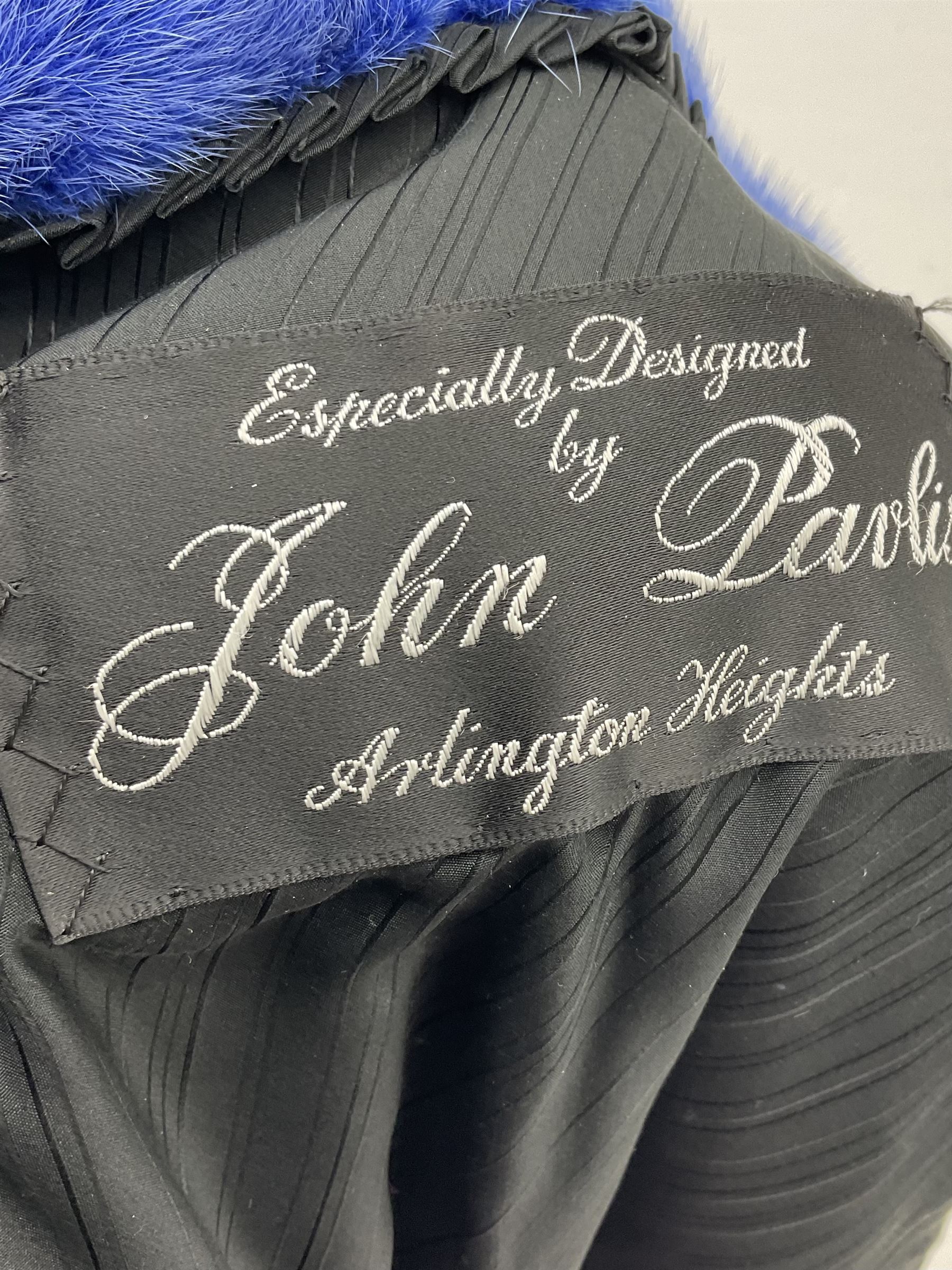 Modern cut lightweight skins lavender blue mink jacket, approx size 10 to 14, with elasticated cuffs, stand up small collar, black satin style lining, zip fastener, perfect condition as new, top class mink.
