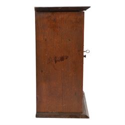 Oak smoking cabinet, with hinged lid, the glazed door opening to reveal a fitted interior, over a single drawer, together with a wooden tobacco box with lid, cabinet H39cm