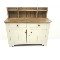  White painted and waxed pine dresser, two drawers and two cupboards, raised two heights plate rack, W141cm, H178cm, D48cm  