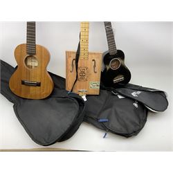 APC Carvalho acacia/koa and mahogany ukulele No.4030351 L66cm; small ukulele in speckled ebonised case; and a novelty three-stringed instrument as a simulated oblong cigar box labelled 'No.5 Blue Box Guitar'; all in carrying cases (3)