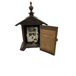 A German musical alarm clock (model 1523/24) made by the Hamburg Amerikanische Uhrenfabrik c1880, in an oak case with an architectural top and finial, two-part dial with a gilt centre, ivorine chapter and steel spade hands, with roman numerals and minute track, case raised on four bun feet, with a thirty-hour balance wheel pin pallet spring driven movement sounding the alarm on a musical movement, key wound and set from the rear. Compete with three different and changeable musical movements in their original box. These clocks would have been sold as here with separate musical movements, it is rare to find them with the original clock.
H30 W17 D11 

	



