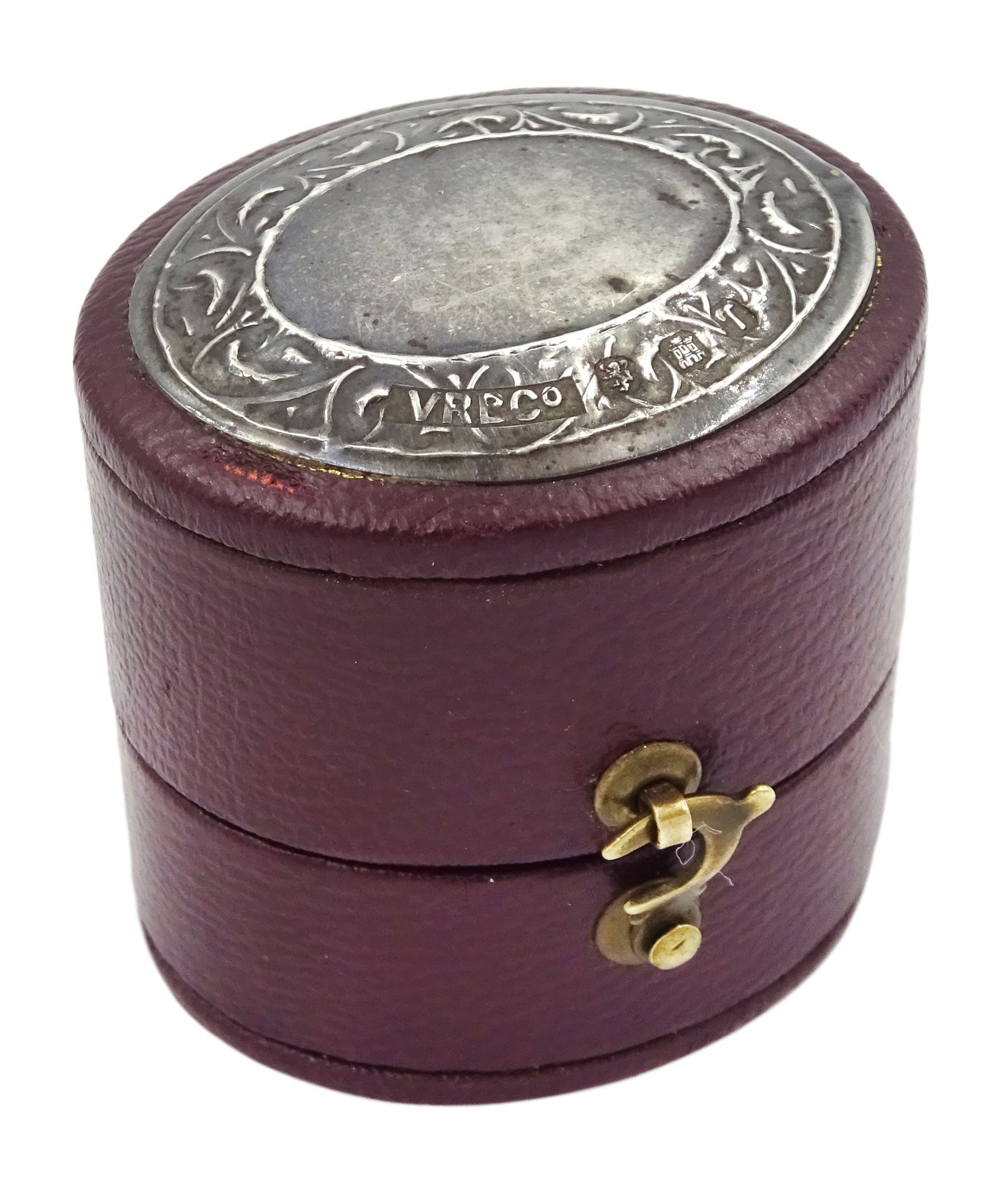 18ct white gold three stone oval ruby and round brilliant cut diamond ring, with diamond set shoulders, stamped, ruby approx 1.15 carat, total diamond weight approx 0.55 carat, in silver top ring box by The Victorian Ring Box Co, Edinburgh 1993 