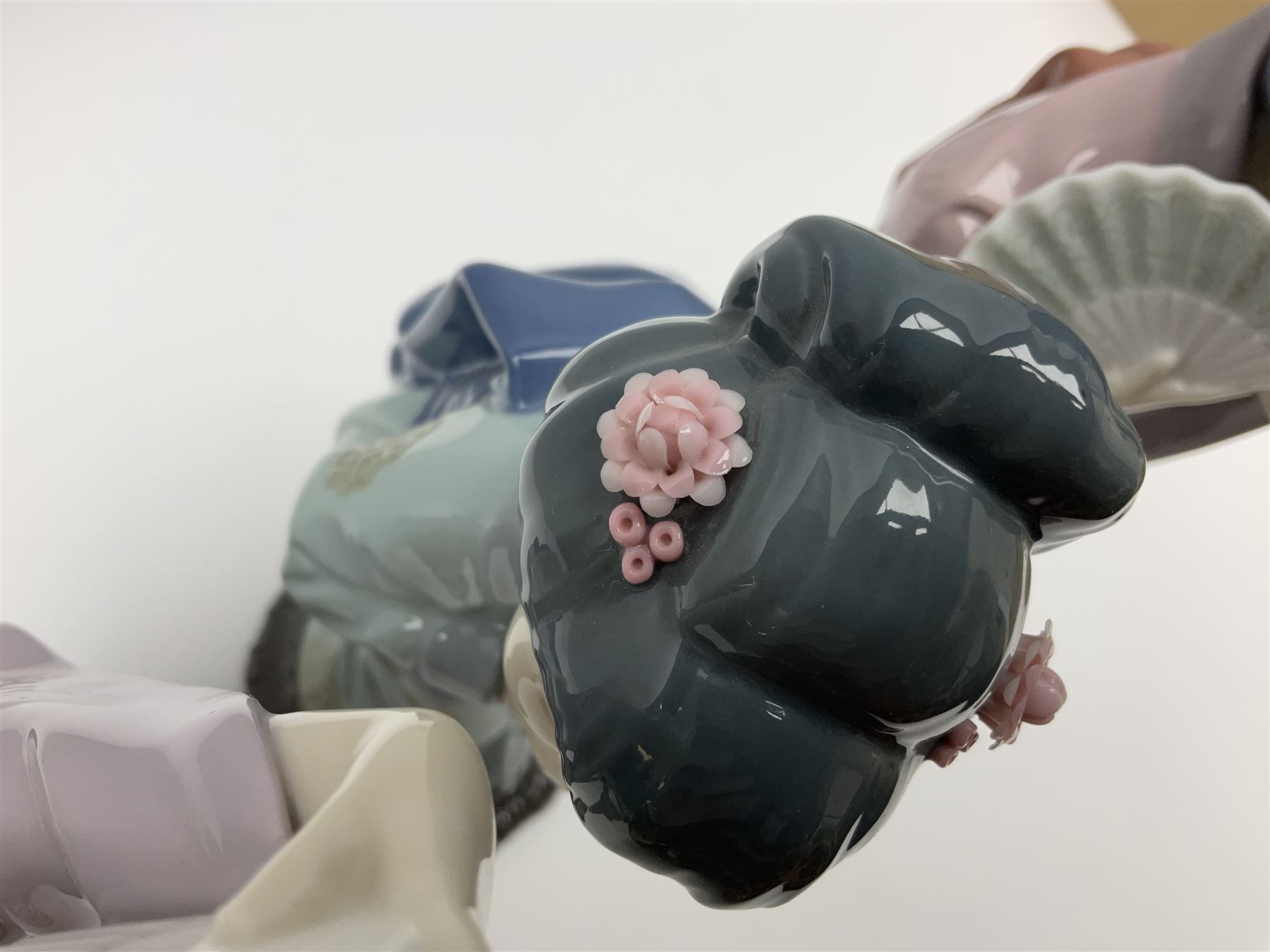 Three Lladro Japanese figures, comprising Sayonara no. 4989, Chrysanthemum no. 4990 and Madame Butterfly no. 4991, largest H30cm