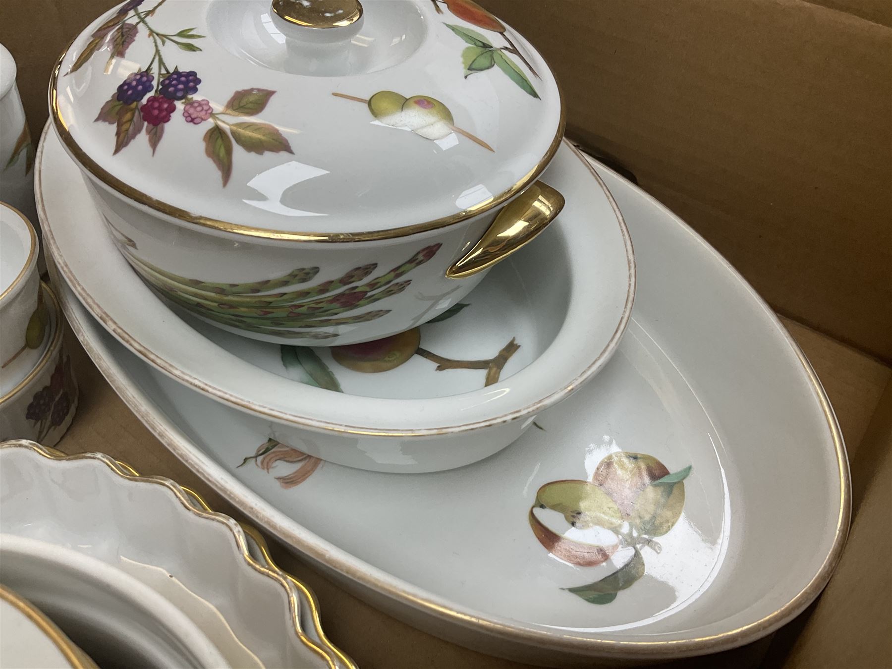 Royal Worcester Evesham and Evesham Vale tea and dinner wares, to include, three large covered tureens, coffee pot, eight tea cups and saucers, milk jug, two covered sucriers, boxed serving spoons etc, approx .130