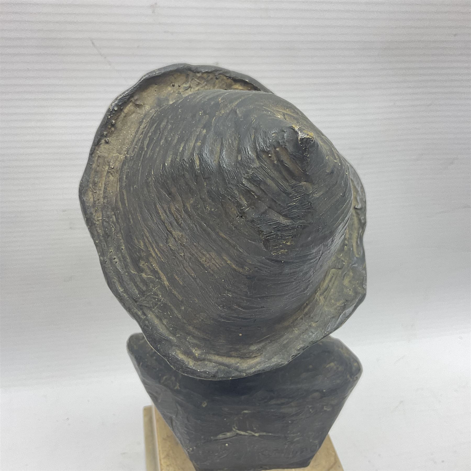 After Giovanni De Martino (1870-1935); bronzed bust of a boy on square marble plinth, H23cm