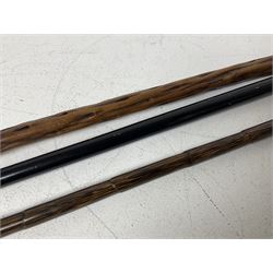 19th century painted bamboo walking cane, the handle carved as a fox with glass eyes, with gilt metal stamped LB, together with an ebonised wooden walking stick, with horn pommel and hallmarked silver collar and a curved wooden walking stick, with monogrammed white metal cap, tallest L90cm