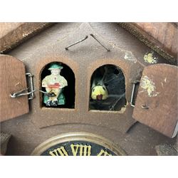 Three 20th century cuckoo clocks and weights for parts or repair.

