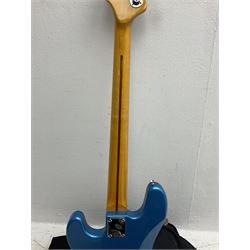 Richwood electric bass guitar in blue, cream and natural finish L117cm; in Fender soft carrying case; together with Behringer Thunderbird Bx108 amplifier date code 0 4 11.