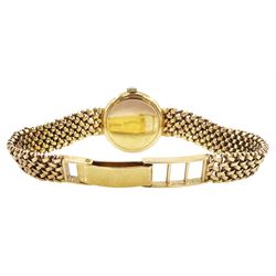 Omega ladies 9ct gold manual wind wristwatch, on integral 9ct gold bracelet, hallmarked