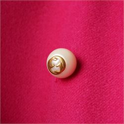 Gucci - wool ruffle-front single-breasted coat in bright fuchsia pink, with high ruffled collar, cascading ruffle trim to the front, collar and cuffs, faux pearl and gilt GG monogram logo button fastening, size 44, unused with the original garment bag and hanger