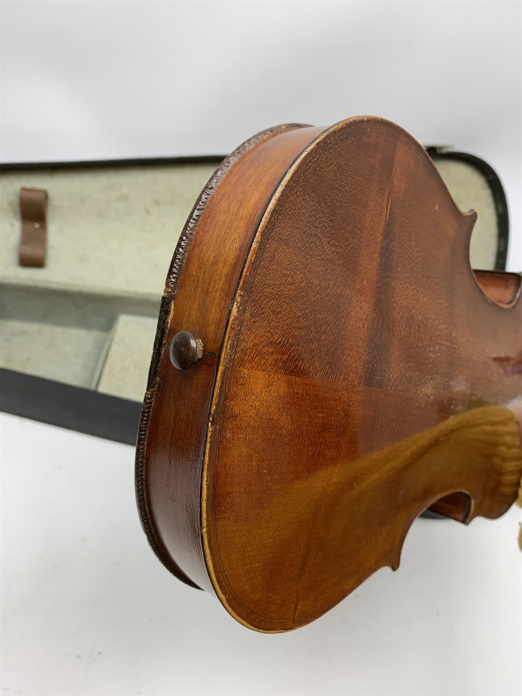 1920s German violin for completion with 36cm two-piece maple back and ribs and spruce top, lacks tailpiece, bridge and strings, 59cm overall, in carrying case