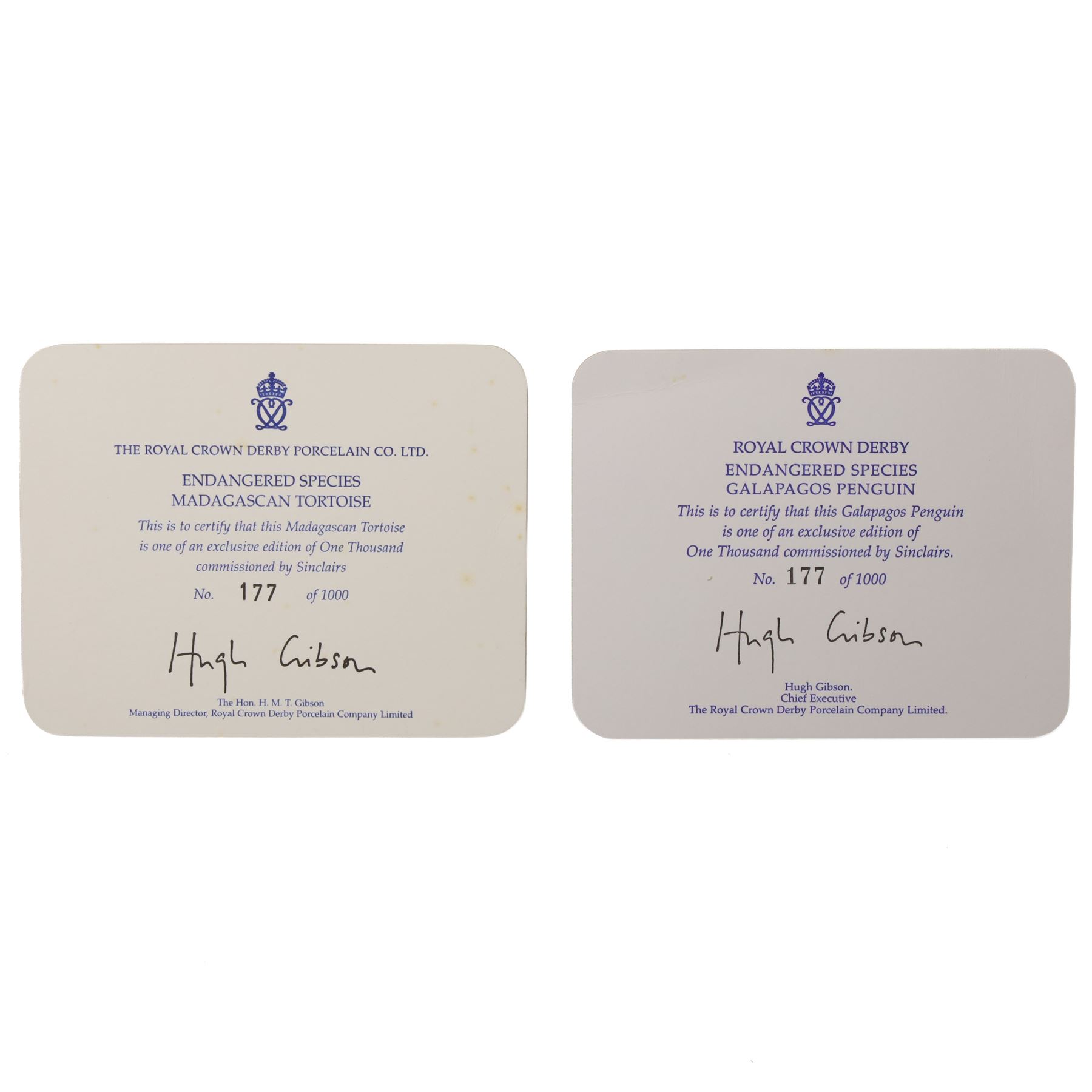 Royal Crown Derby paperweights, Galapagos Penguin limited edition 177/1000 and Madagascan Tortoise 177/1000, both from the Endangered Species series with gold stoppers and certificates