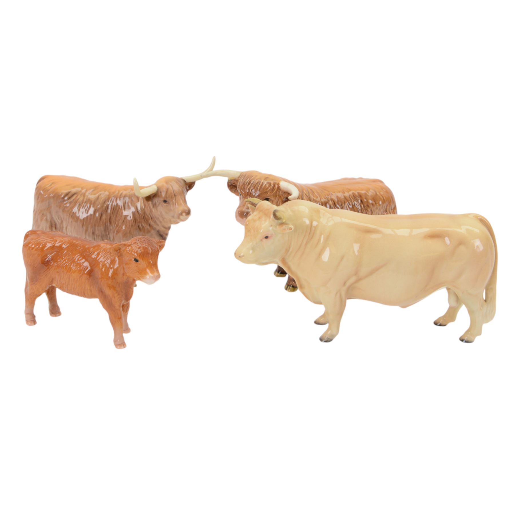 Beswick Highland Cattle family group, comprising bull, cow and calf, together with Charolais bull
