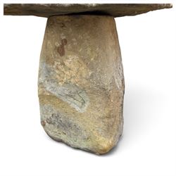 Pair of 19th century weathered hewn sandstone two-piece staddle stones, domed circular top over a tapering base