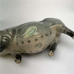 A Beswick CH Wallboy Pig, together with a CH Wallqueen Sow, a Gloucester Old Spot, with maker's box, and a Royal Doulton Pot Bellied Pig, and Piglet, with maker's box, each with printed mark beneath.