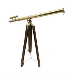 Large telescope, on a folding wooden and brass tripod, L98cm