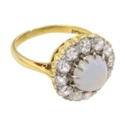 Early 20th century opal and old cut diamond cluster ring, stamped 18ct Plat, total diamond weight approx 1.00 carat